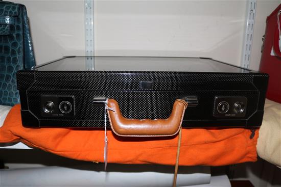 An Hermes of Paris tan leather and carbon fibre briefcase, 16.75in.